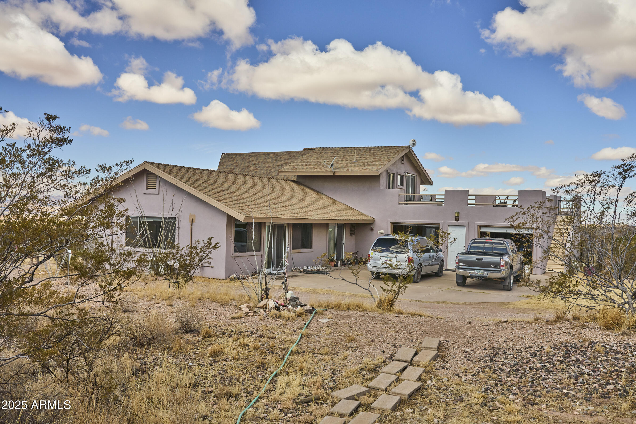 Undisclosed Address Bisbee, AZ 85603 - Photo 56 of 78 a view of a house with a snow in the yard