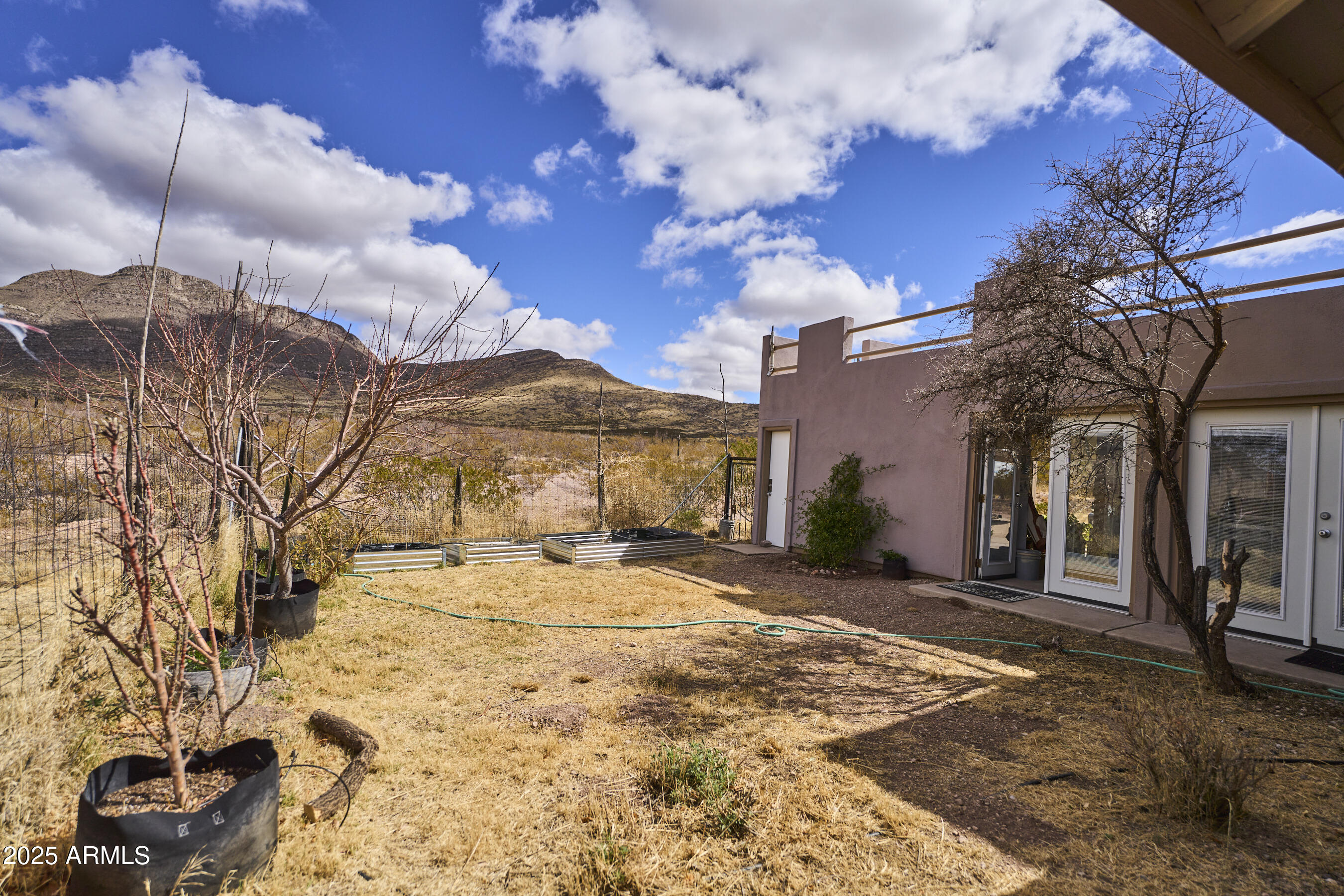 Undisclosed Address Bisbee, AZ 85603 - Photo 60 of 78 a view of a building with snow on the roadside