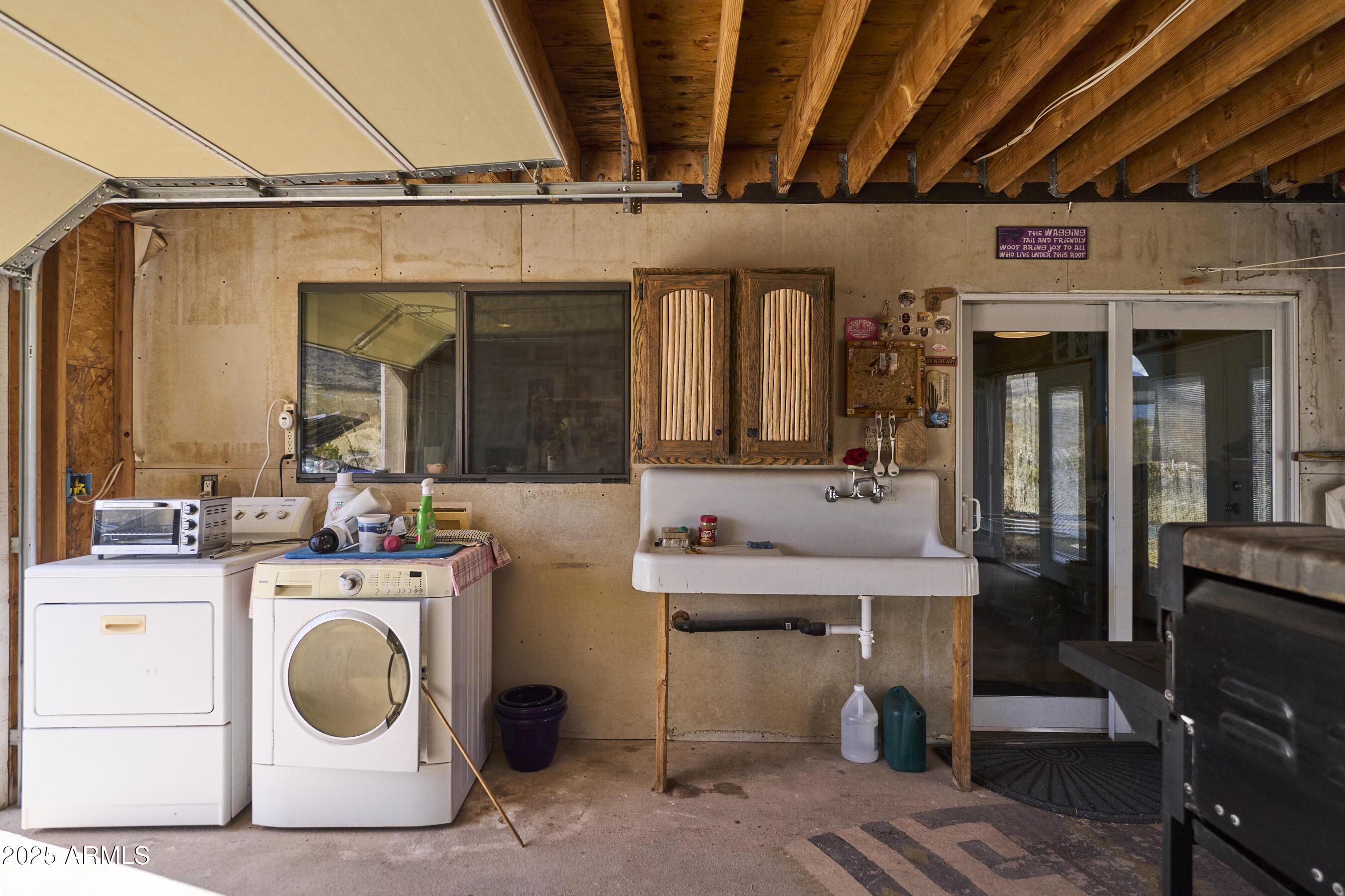 Undisclosed Address Bisbee, AZ 85603 - Photo 62 of 78 a utility room with dryer and washer