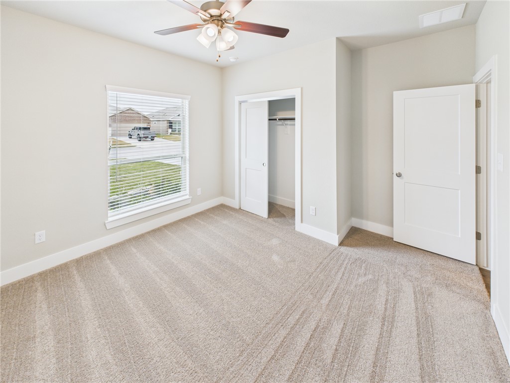 5306 Lyle Place Bryan, TX 77807 - Photo 13 of 18 a view of an empty room with a window