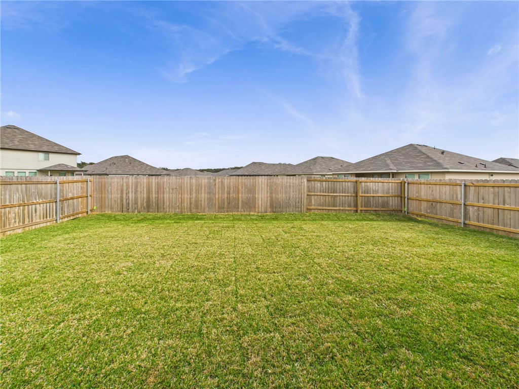 5306 Lyle Place Bryan, TX 77807 - Photo 17 of 18 a view of a backyard with a garden