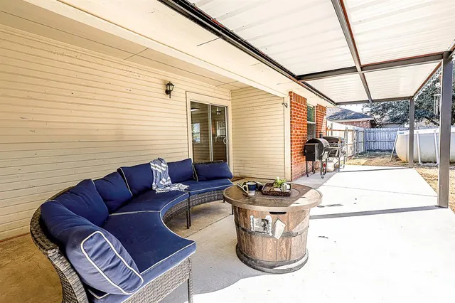 a outdoor living space with furniture