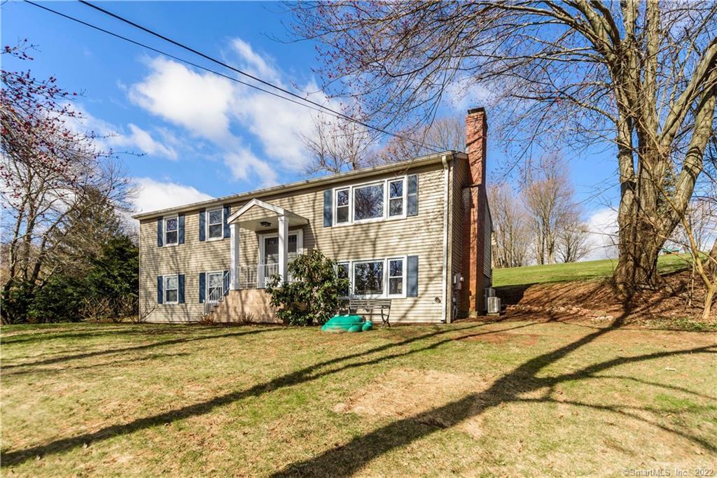 118 Summit Farms Road Southington, CT 06489 - Photo 1 of 1 a front view of house with yard