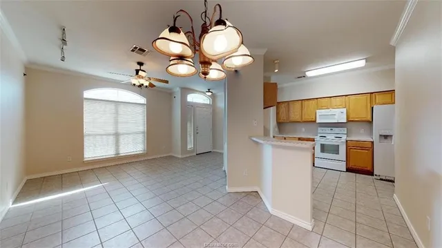 a view of a kitchen with a sink and cabinet