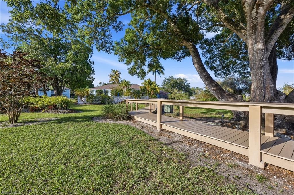 5737 Whitaker Road, Unit C101 Naples, FL 34112 - Photo 11 of 28 a view of park with plants