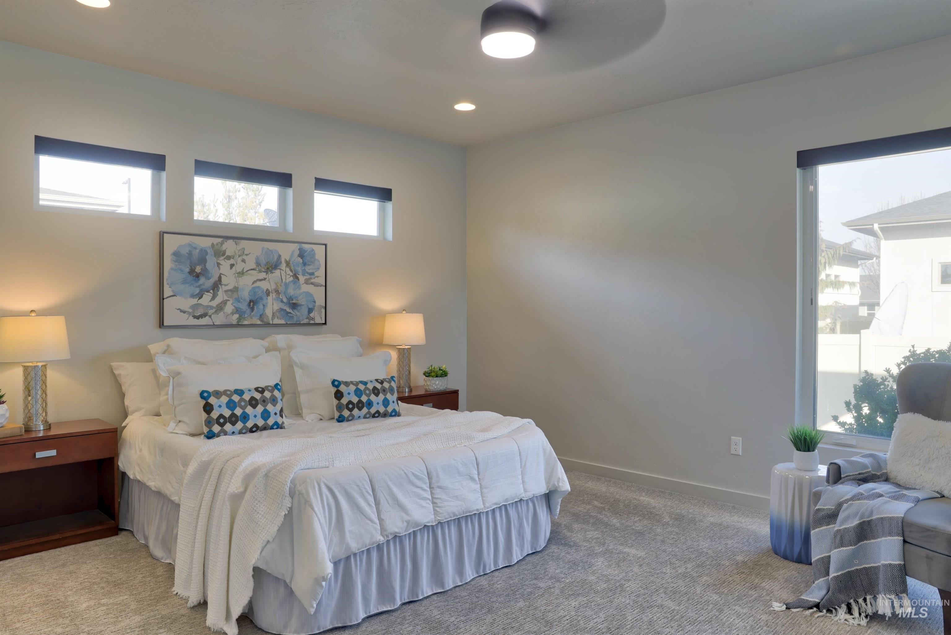 4148 East Copper Point Drive Meridian, ID 83642 - Photo 10 of 26 Bedroom featuring carpet, a ceiling fan, and recessed lighting