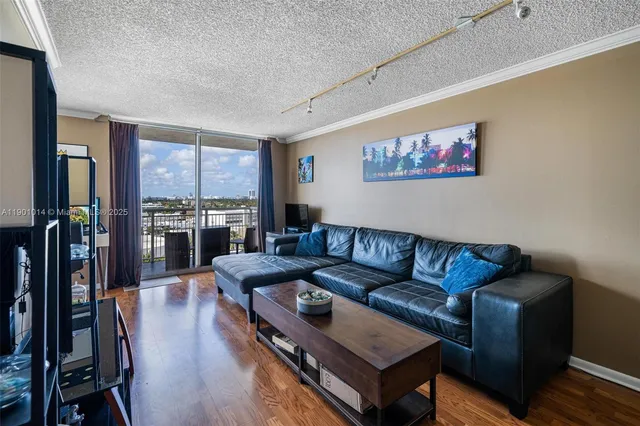 a living room with furniture fireplace and flat screen tv