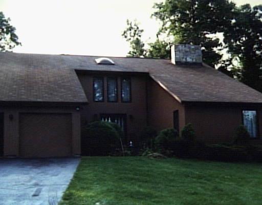 69 Peaceful Valley Road Trumbull, CT 06611 - Photo 1 of 1 a backyard of a house with lots of green space