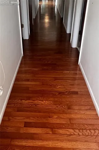 an empty room with a empty space and a window