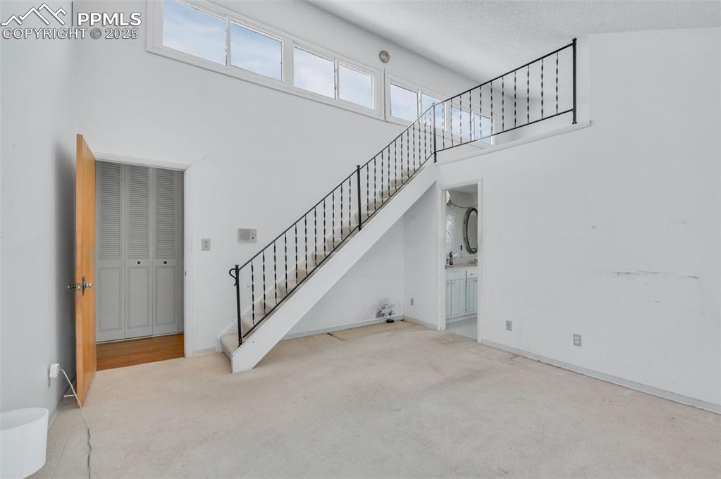 24975 Sanborn Road Calhan, CO 80808 - Photo 20 of 50 Stairs lead to the loft study