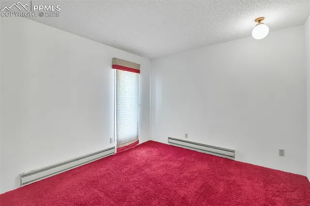 a bathroom with a shower sink and mirror