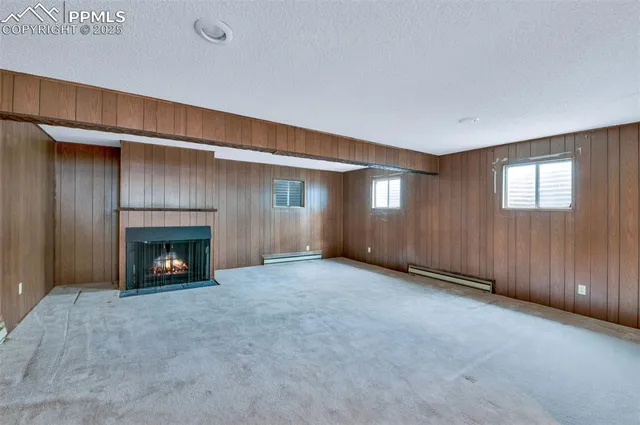 a view of an empty room with a garage