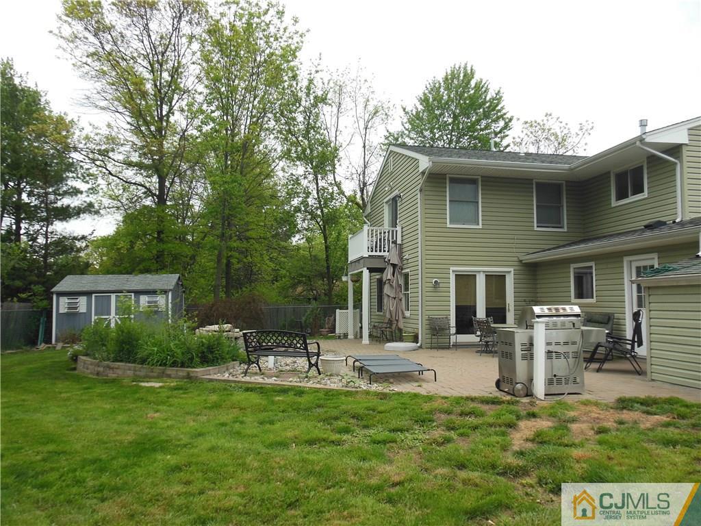 13 Russett Road Somerset, NJ 08873 - Photo 2 of 20 a front view of a house with garden