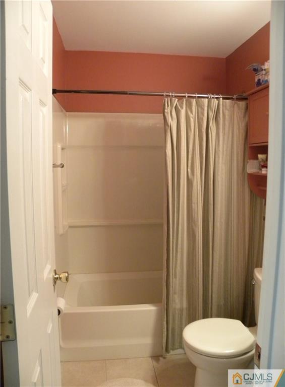 13 Russett Road Somerset, NJ 08873 - Photo 17 of 20 a bathroom with a shower and a toilet