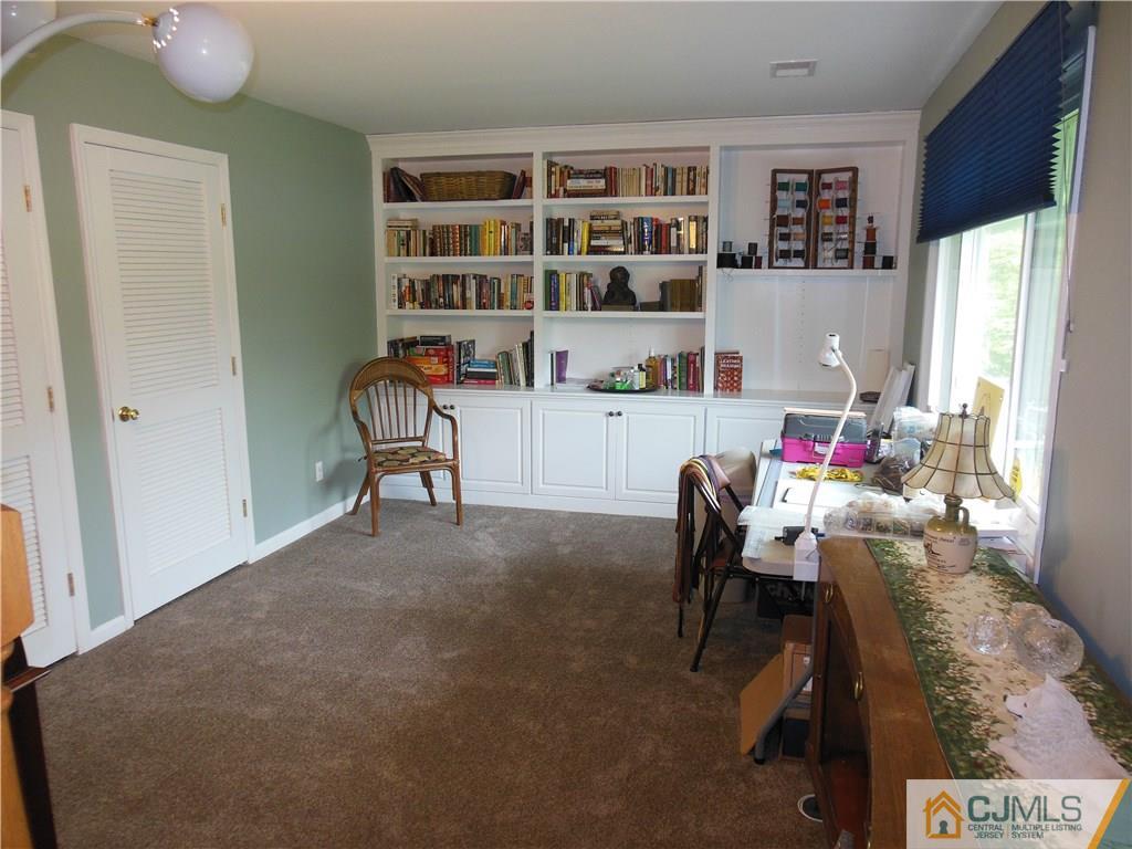 13 Russett Road Somerset, NJ 08873 - Photo 4 of 20 a workspace with furniture and window