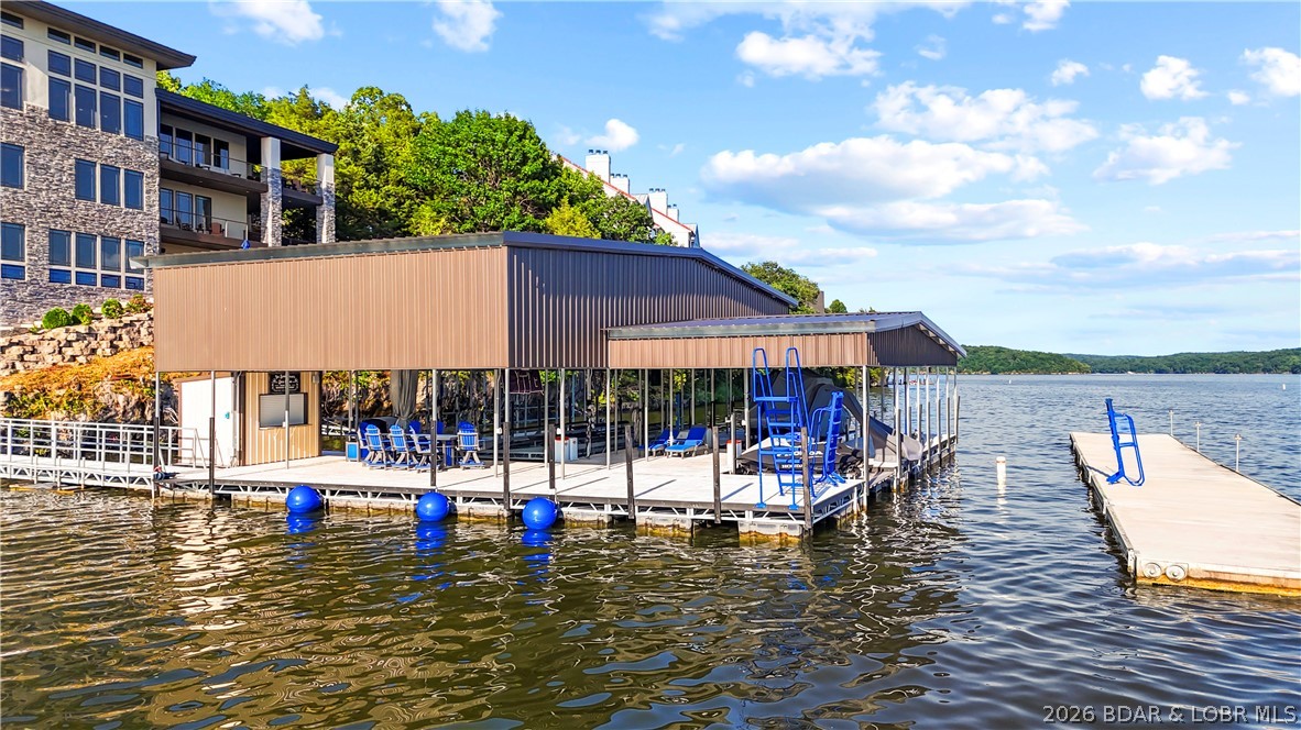 777 Malibu Road Osage Beach, MO 65065 - Photo 82 of 100 Spanning over 4,000 sq ft, this dock blends functi