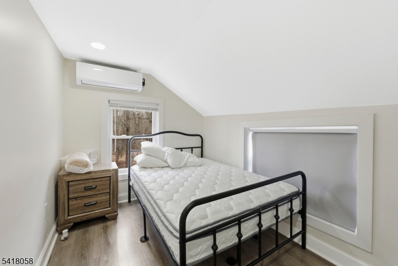 28 Wagners Lane Warren, NJ 07059 - Photo 34 of 50 a bedroom with a bed and a dresser