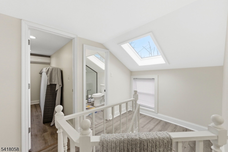 28 Wagners Lane Warren, NJ 07059 - Photo 36 of 50 a living room with furniture and a table