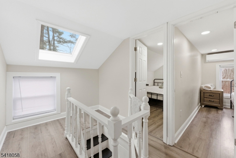 28 Wagners Lane Warren, NJ 07059 - Photo 37 of 50 a view of an entryway with wooden floor and windows