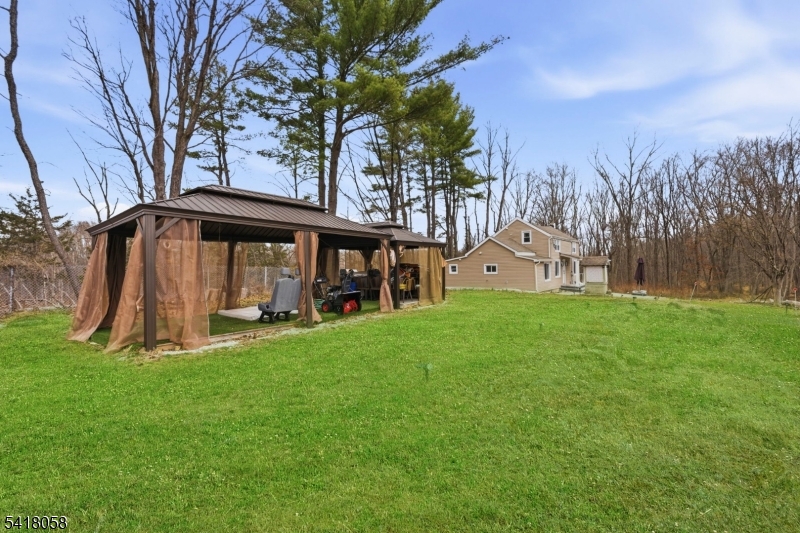 28 Wagners Lane Warren, NJ 07059 - Photo 46 of 50 a view of a house with a yard