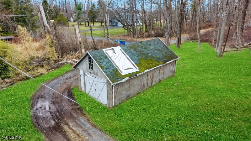 28 Wagners Lane Warren, NJ 07059 - Photo 9 of 50 a view of a backyard with wooden fence