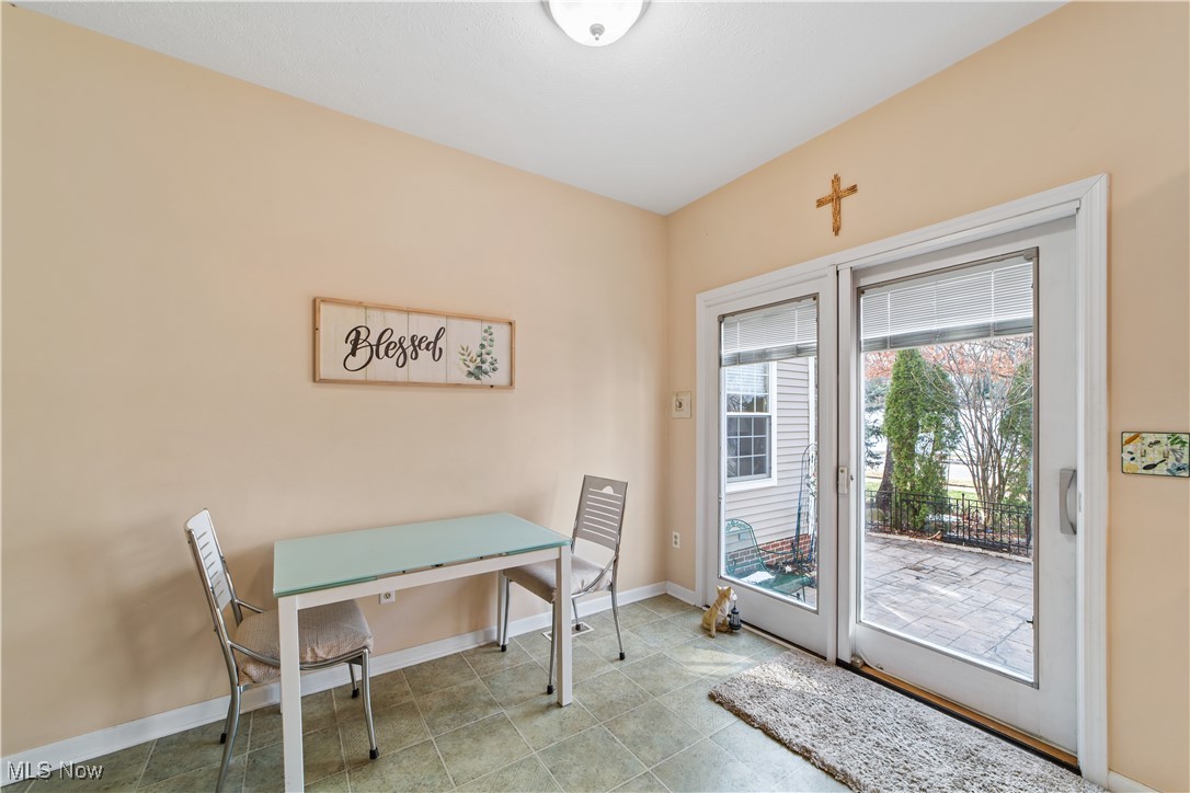 4461 Sexton Road Cleveland, OH 44105 - Photo 12 of 47 Tiled dining room featuring baseboards