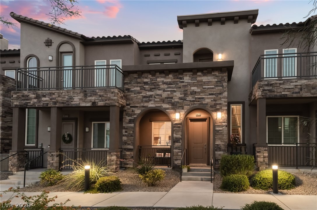6432 Spring Jog Street Las Vegas, NV 89166 - Photo 48 of 61 Artful stone and stucco blend for a striking contemporary façade.