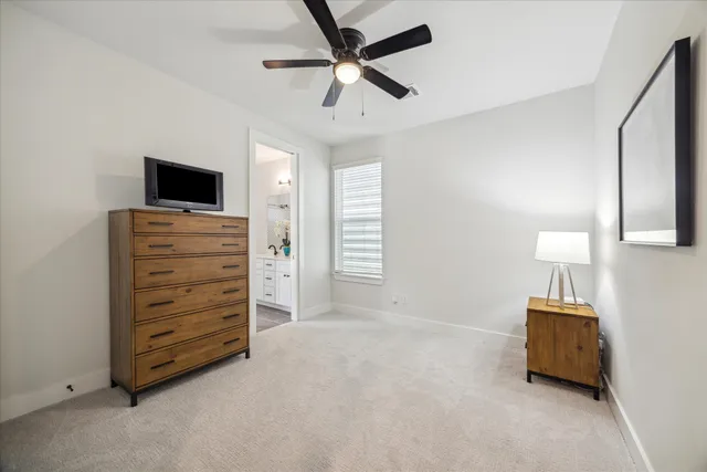 a room with furniture and a flat tv screen