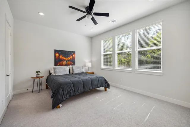 a bed room with a bed and a tv