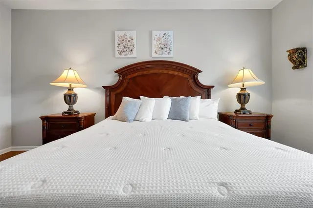 an aerial view of a house with a yard and swimming pool