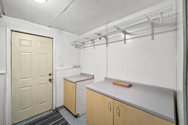 a bathroom with a sink and shower