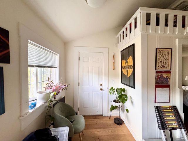 a bathroom with a sink mirror and toilet