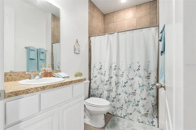 a large white room with furniture