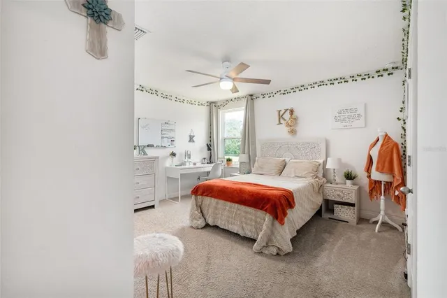 a en suite bathroom with a sink and a mirror