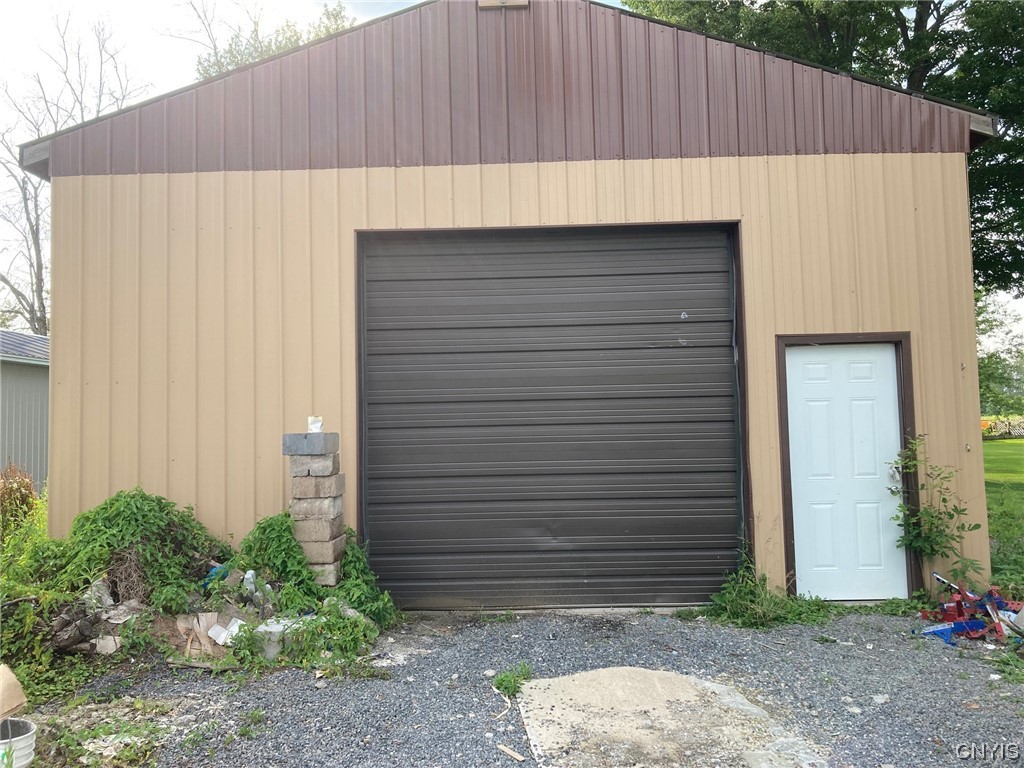 1378 County Rte 12 Schroeppel, NY 13132 - Photo 27 of 35 Pole Barn located across the street from home.