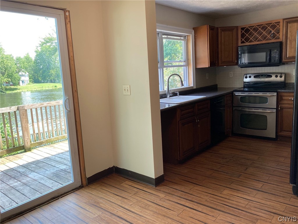 1378 County Rte 12 Schroeppel, NY 13132 - Photo 9 of 35 Dining, looking into kitchen