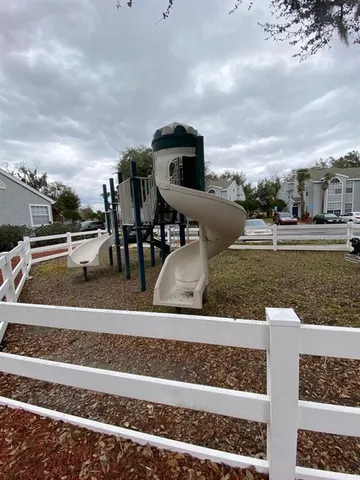 a view of a terrace with chairs