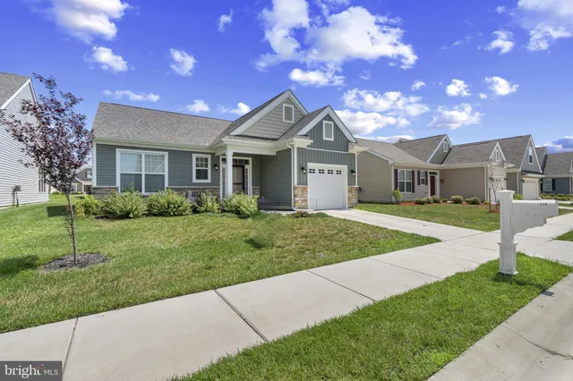 a house view with a garden space