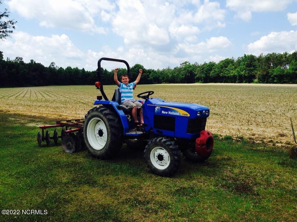 10591 Shiloh Road Ivanhoe, NC 28447 - Photo 22 of 38 Tractor and attachments available as well!