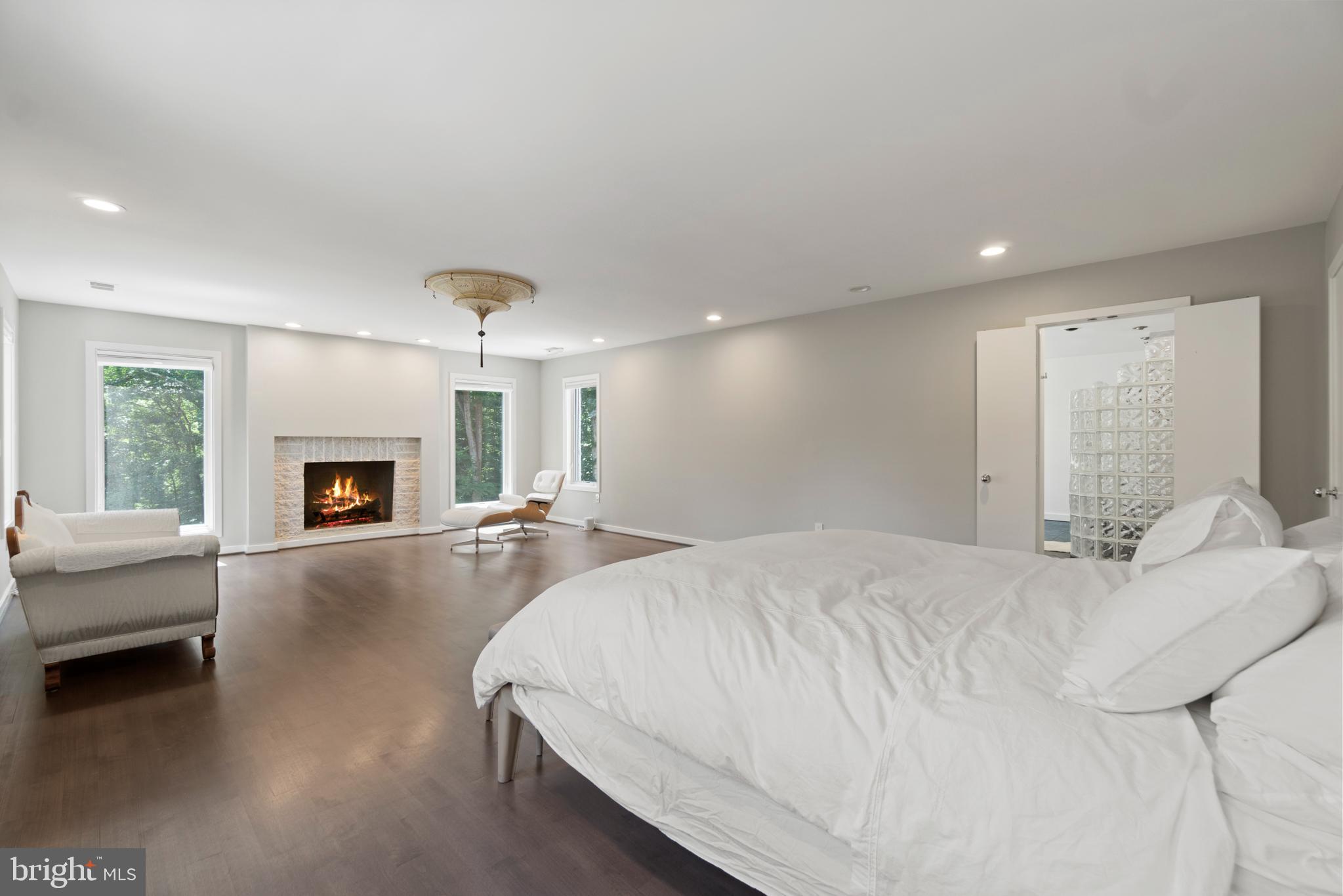 7545 Potomac Fall Road McLean, VA 22102 - Photo 26 of 56 Master bedroom with fireplace