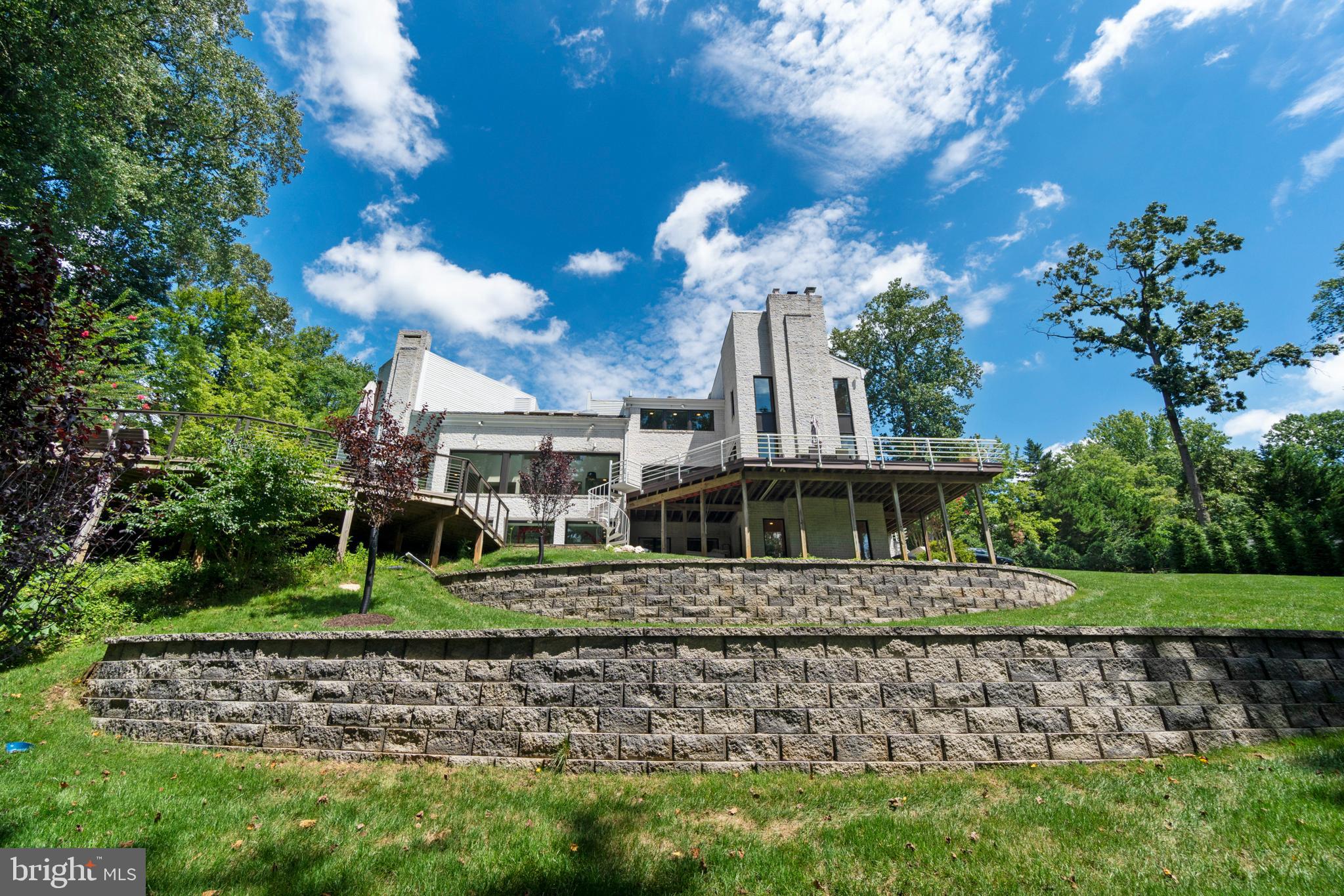 7545 Potomac Fall Road McLean, VA 22102 - Photo 54 of 56 View from woods with retaining walls w/terraces