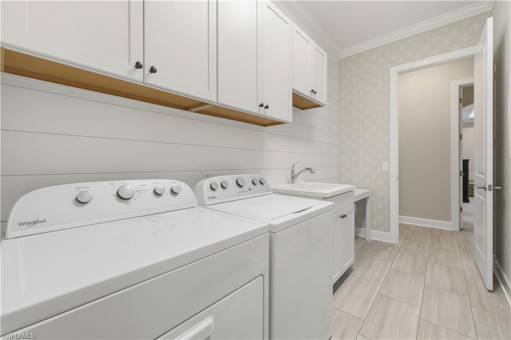 19074 Elston Way Estero, FL 33928 - Photo 20 of 50 a utility room with dryer and washer