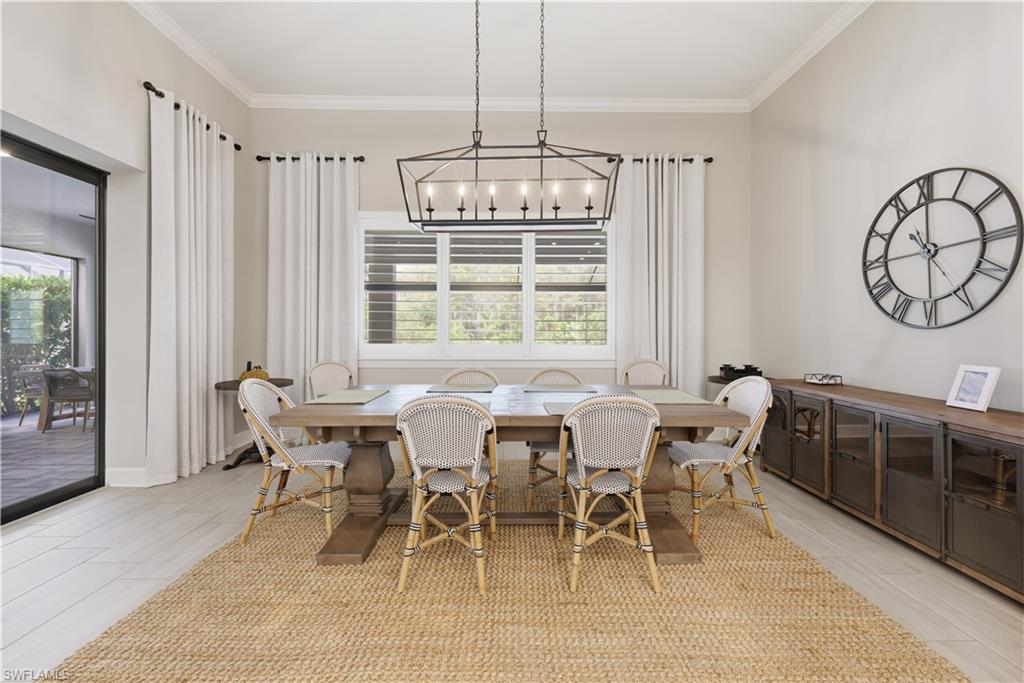 19074 Elston Way Estero, FL 33928 - Photo 25 of 50 a view of a dining room with furniture window and outside view