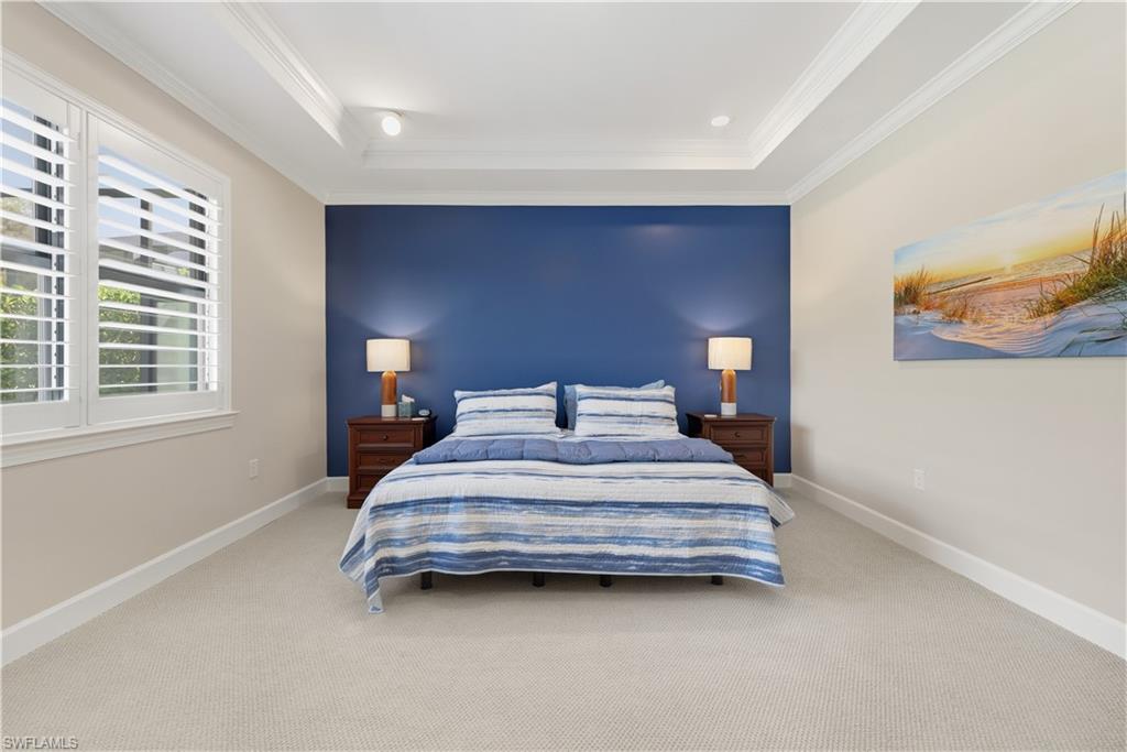 19074 Elston Way Estero, FL 33928 - Photo 28 of 50 a bedroom with a bed and window