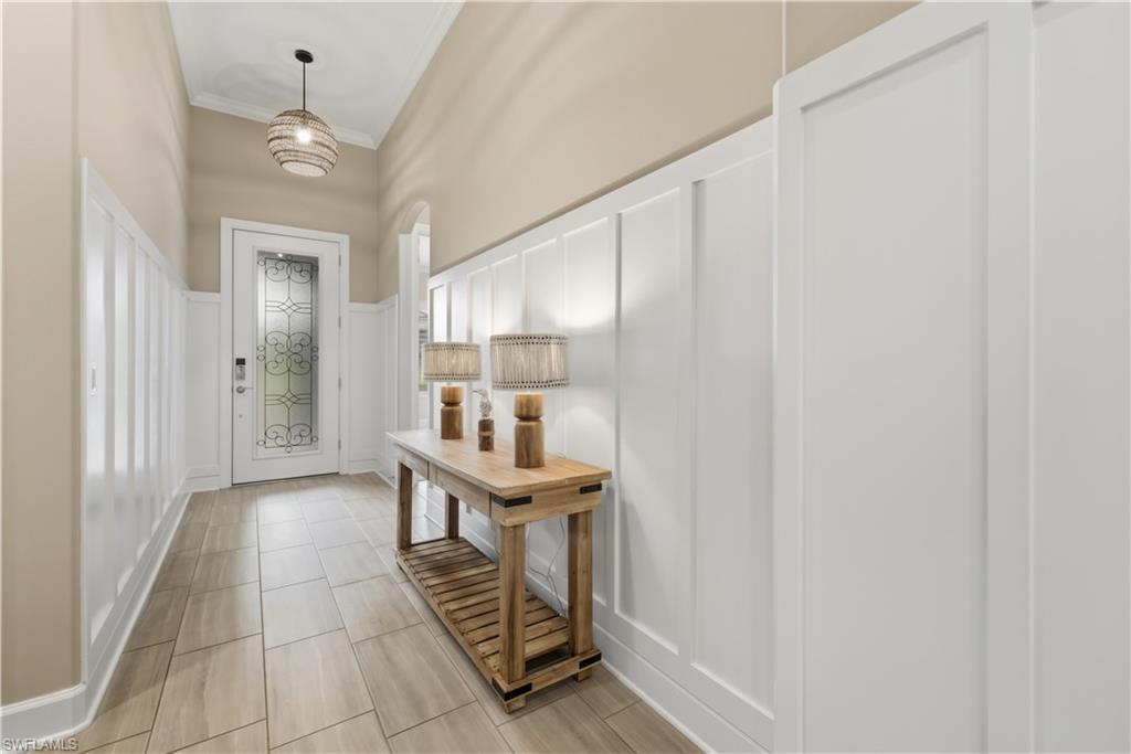 19074 Elston Way Estero, FL 33928 - Photo 3 of 50 a very nice looking room with a dining table and chairs