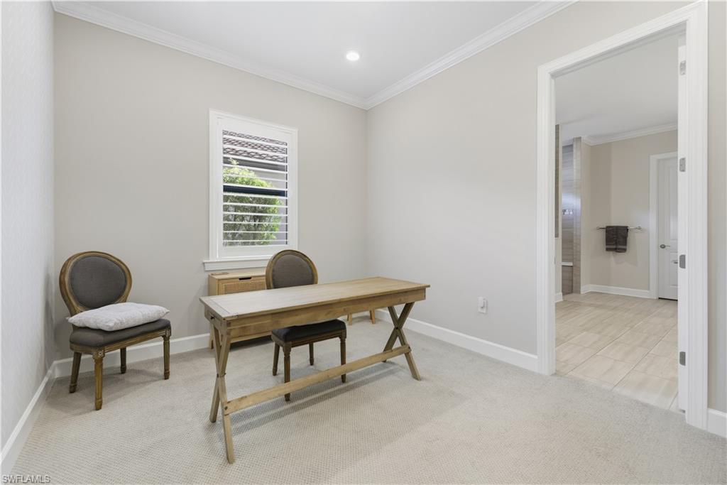 19074 Elston Way Estero, FL 33928 - Photo 31 of 50 a workspace with furniture and a window