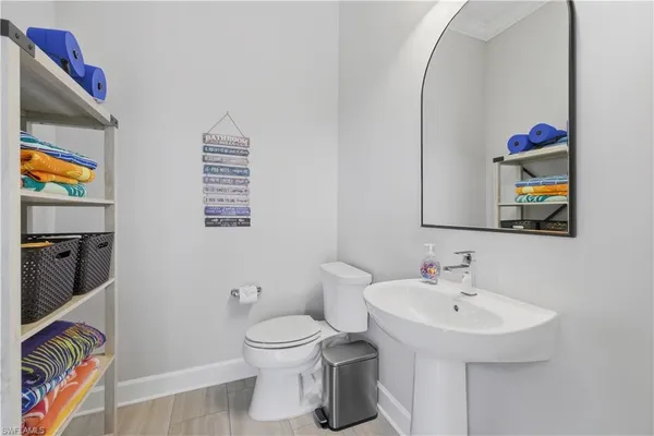 a bathroom with a sink and a toilet