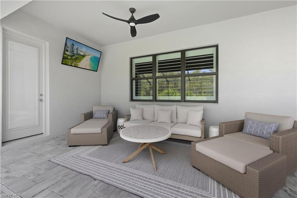 19074 Elston Way Estero, FL 33928 - Photo 37 of 50 a living room with furniture and a window