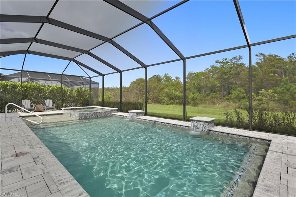19074 Elston Way Estero, FL 33928 - Photo 41 of 50 a view of a backyard with sitting area