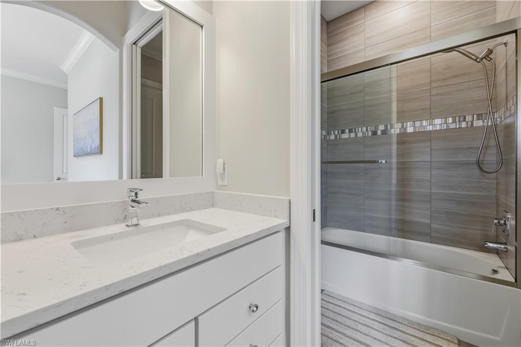 19074 Elston Way Estero, FL 33928 - Photo 8 of 50 a bathroom with a sink and a bathtub